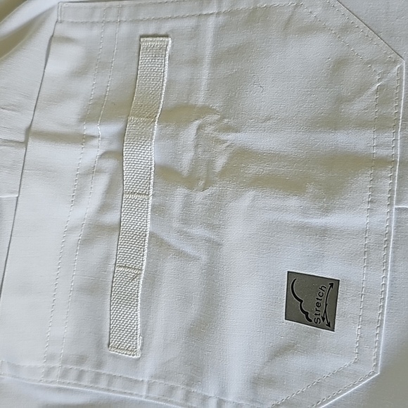 Scrubs, butter-soft. White with lots of pockets.  Cuff style. Size small… - Picture 6 of 8